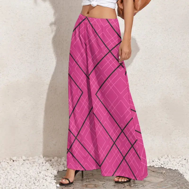 Pink plaid maxi skirt with black diagonal lines and geometric print wide leg pants