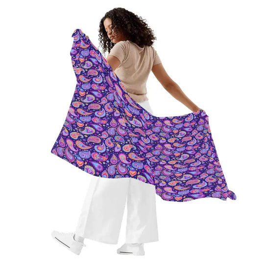 Colorful purple paisley sarong held up to show off its stylish design and vibrant pattern