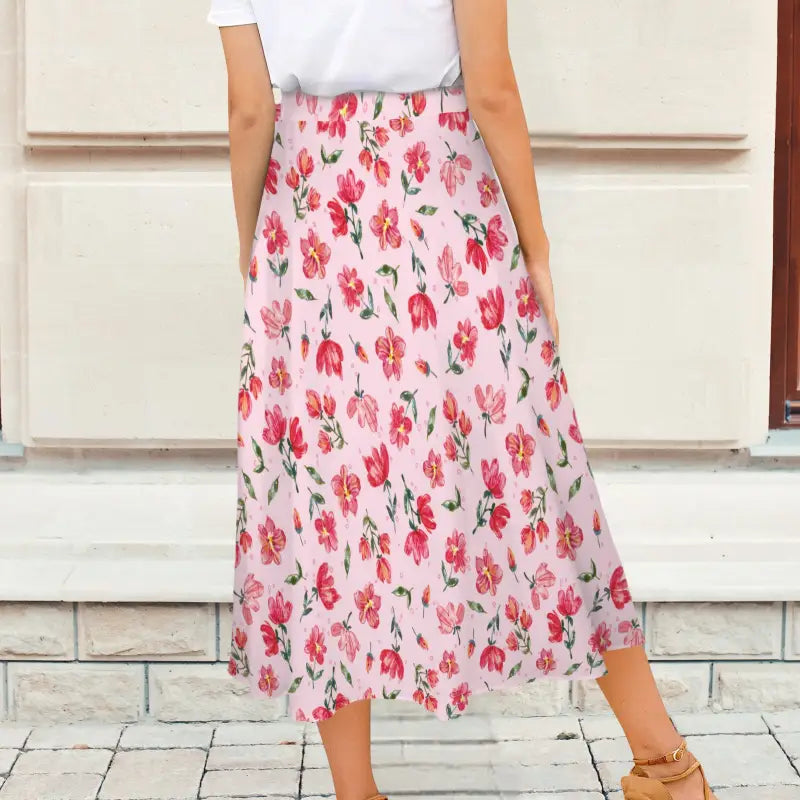 Floral wrap skirt featuring pink and red roses on a white background for a mood boost