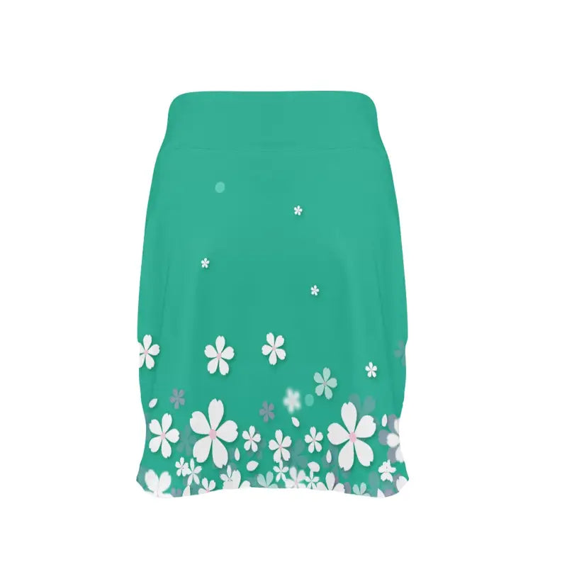 Green golf skirt with white floral pattern, perfect for boho sporty chic looks