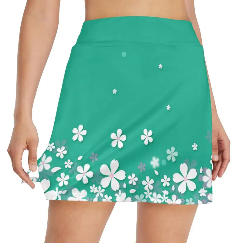 Green floral golf skirt with boho vibes, perfect for effortless sporty chic dresses