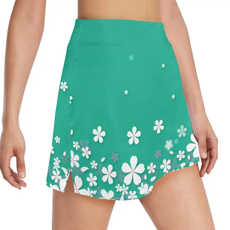 Green floral golf skirt with boho vibes, perfect for sporty chic looks
