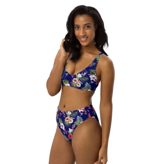 Floral print high-waisted bikini on a blue background for blue tropical Hawaiian vibes