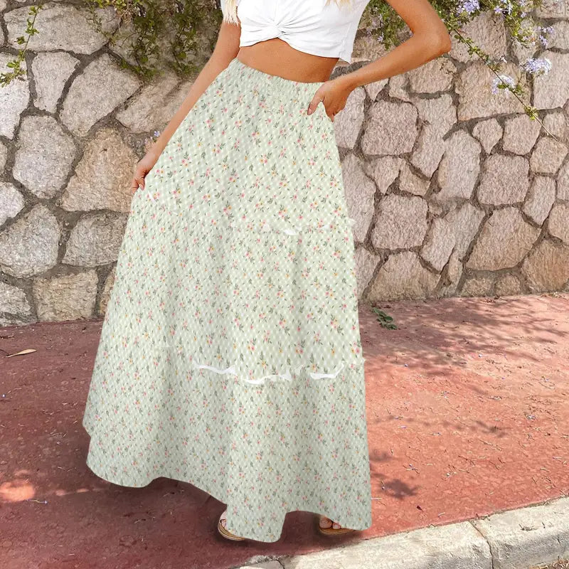 Flowy mint green floral maxi skirt that’s high waisted and perfect for any occasion