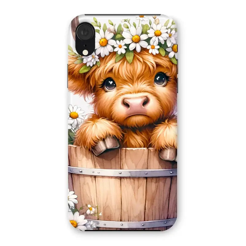 Adorable Highland Cow calf with a daisy crown peeking from a barrel on a phone case