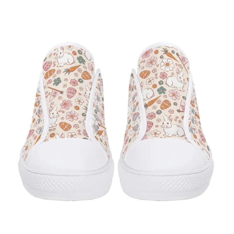 White Easter sneakers with fun hearts and flowers in pink and orange for stylish women