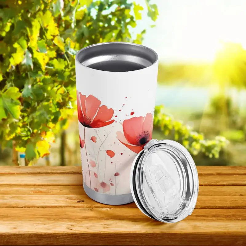 Floral personalized 20oz tumbler featuring a poppy design on a white background