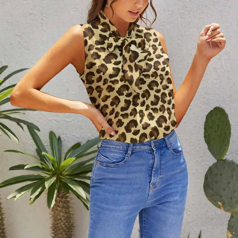 Leopard print sleeveless top with blue jeans for stylish ladies who love wild fashion