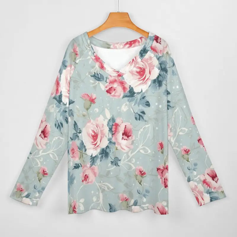 Light blue long-sleeved t-shirt with v-neck design, pink rose floral pattern