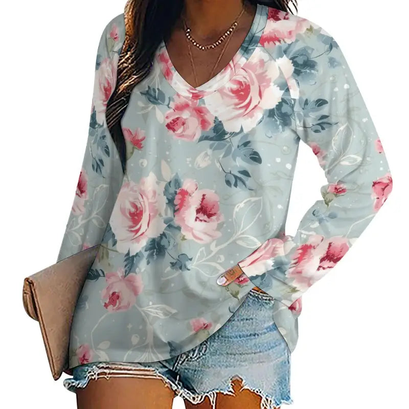 Light blue long-sleeved t-shirt with v-neck design, watercolor pink roses and cozy feel