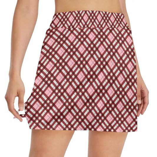 Pink and brown plaid mini skirt with elastic waistband perfect for a women’s golf skort