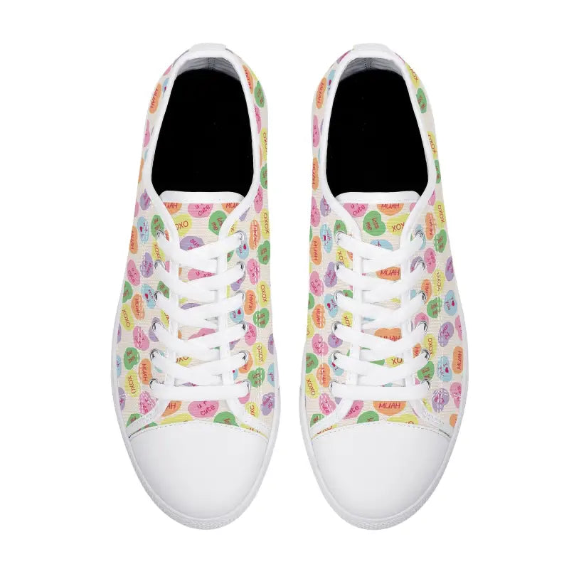 White canvas candy hearts sneakers for women with a fun colorful heart pattern