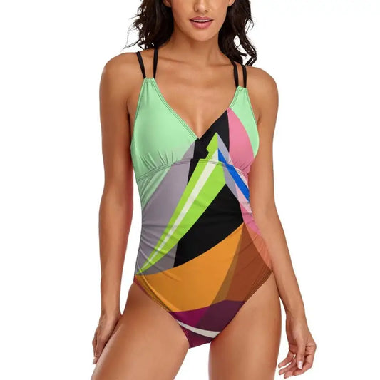 Colorful green abstract pattern one-piece swimsuit with thin straps for a stylish swim