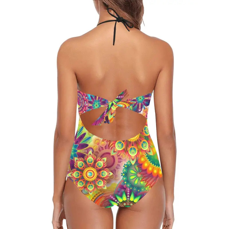 Colorful one piece swimsuit tie back with lace band and vibrant tie-dye pattern