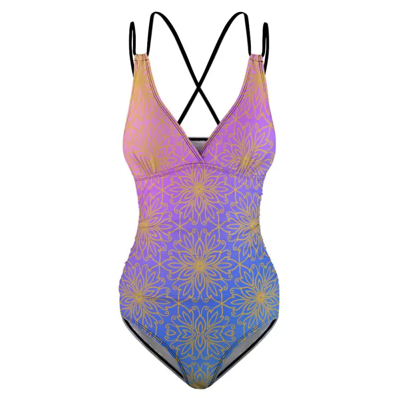 Women’s ombre one piece bathing suit with criss cross straps and floral design