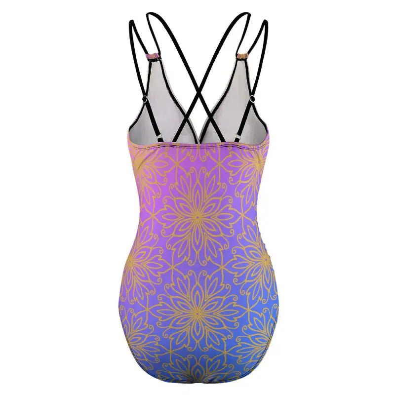 Stylish geometric one piece swimsuit with criss cross straps and purple-blue ombre design