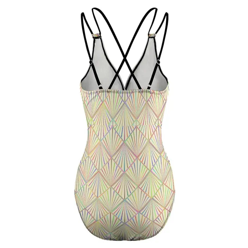 Light yellow one-piece swimsuit with art deco pattern and criss cross back for fun