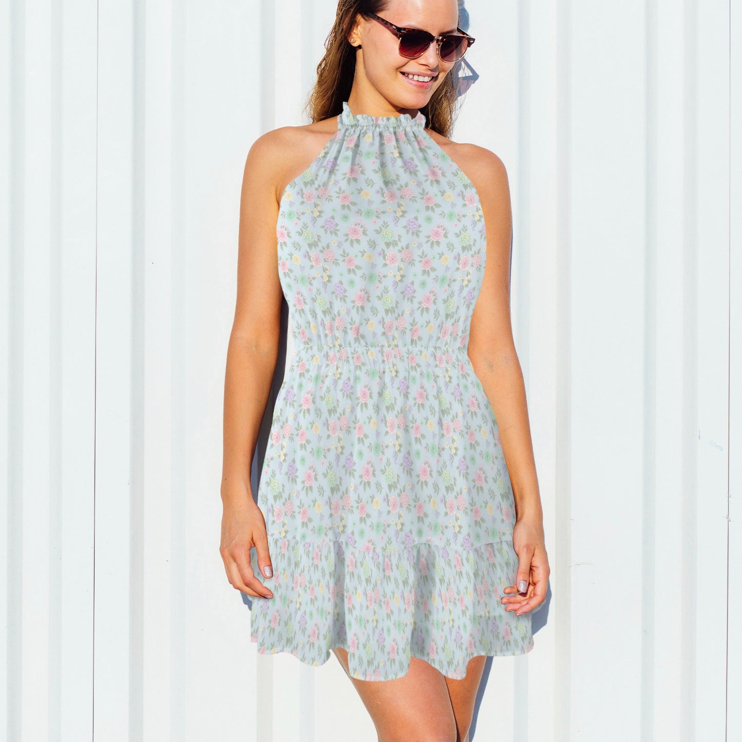 model wearing pastel floral halter mini dress lightweight summer style