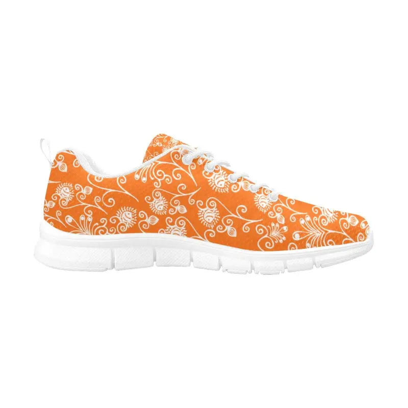 Orange floral breathable sneakers featuring a white floral pattern and sole