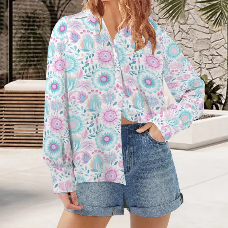 Pastel Boho Long Sleeve blouse with pink and turquoise flowers paired with denim shorts