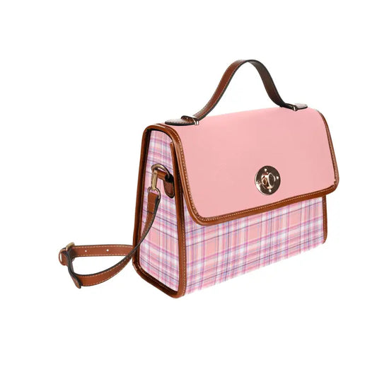 Pink and plaid handbag with brown leather trim, perfect to effortlessly carry your style vibes