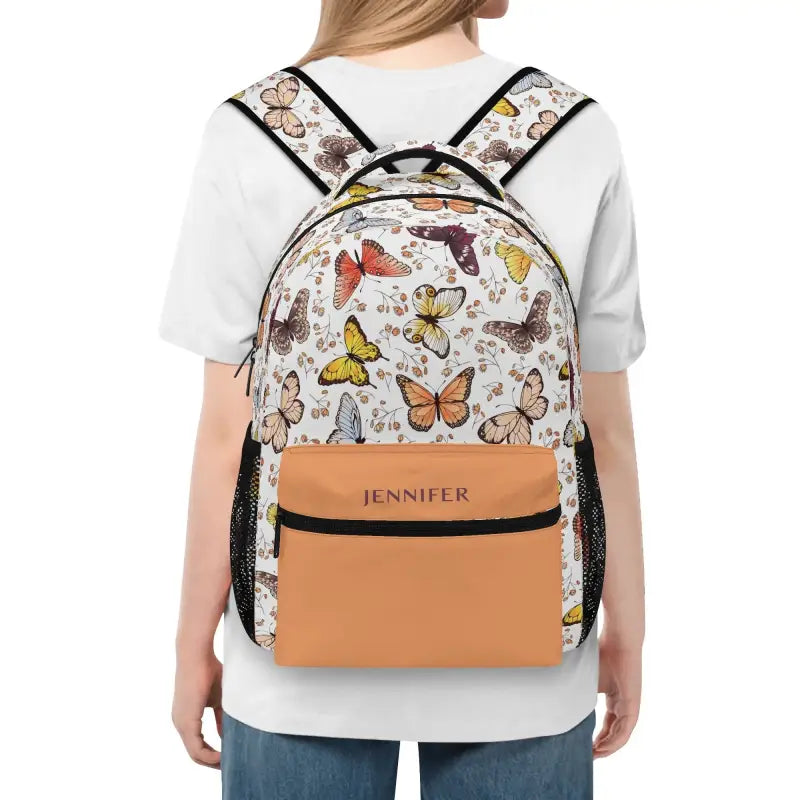 Personalized Butterfly Backpack with colorful print and tan pocket for stylish scholars