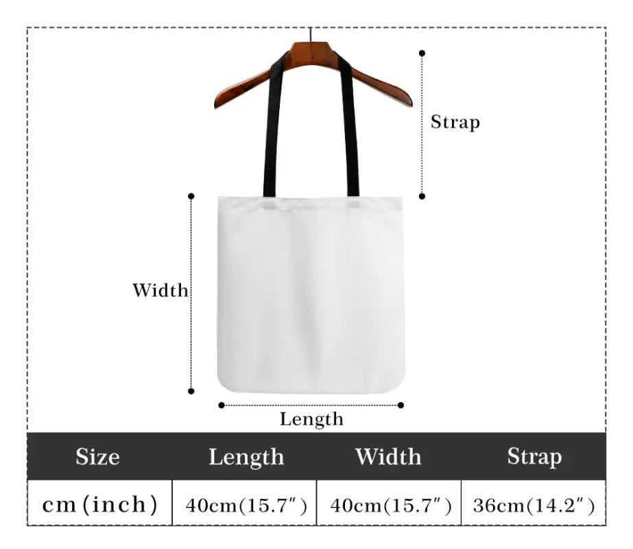 White Chicken Tender Cloth Tote Bag with black straps hanging on a wooden hanger