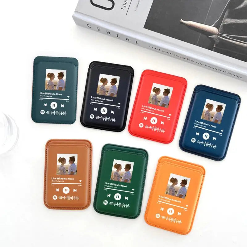 Colorful MagSafe card holders showcasing a music player and custom album artwork