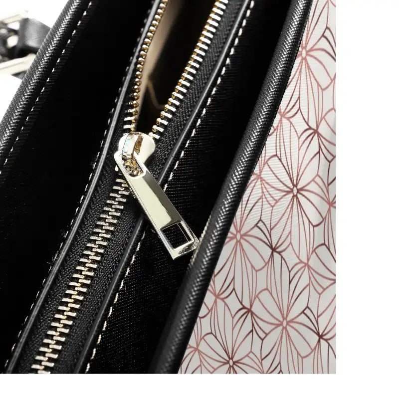 Close-up of a zipper on a Personalized Shoulder Tote with adjustable handles