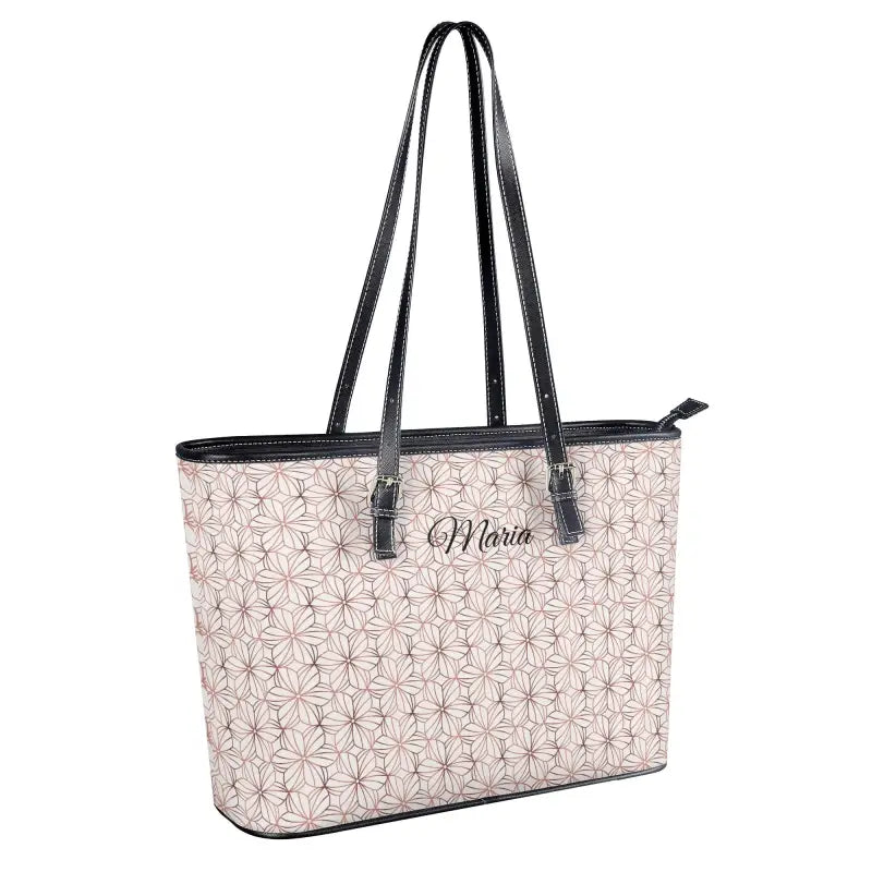 Pale pink personalized shoulder tote bag with geometric pattern, adjustable handles, zip closure