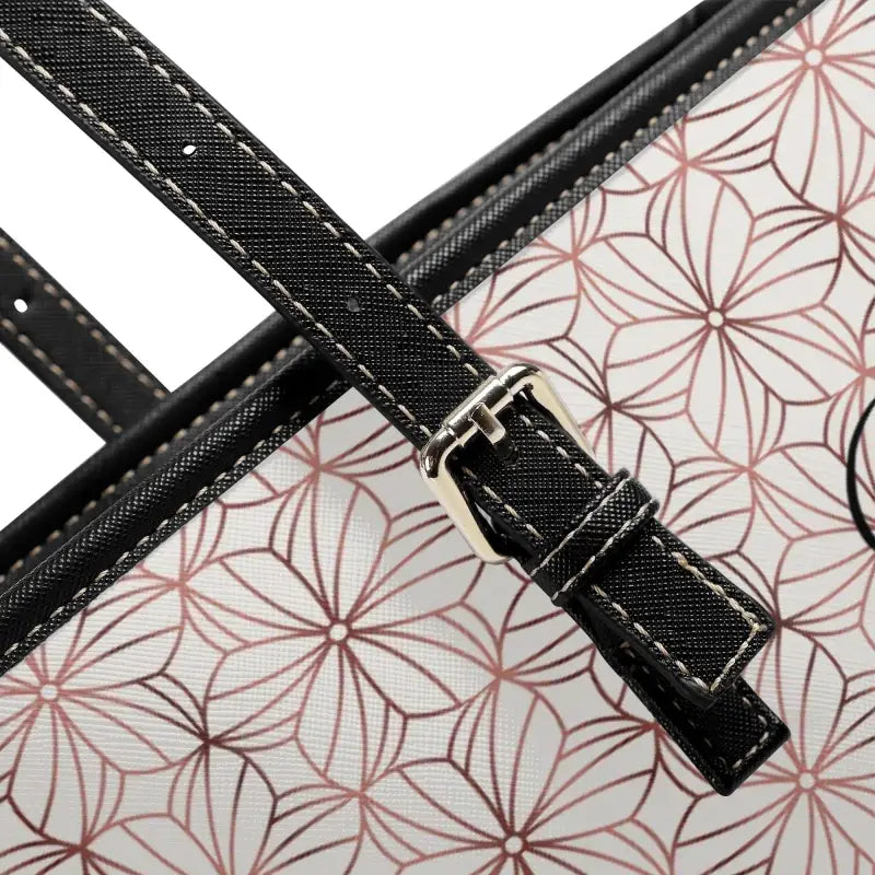 Handbag with a geometric floral pattern, adjustable handles, perfect for a personalized shoulder tote