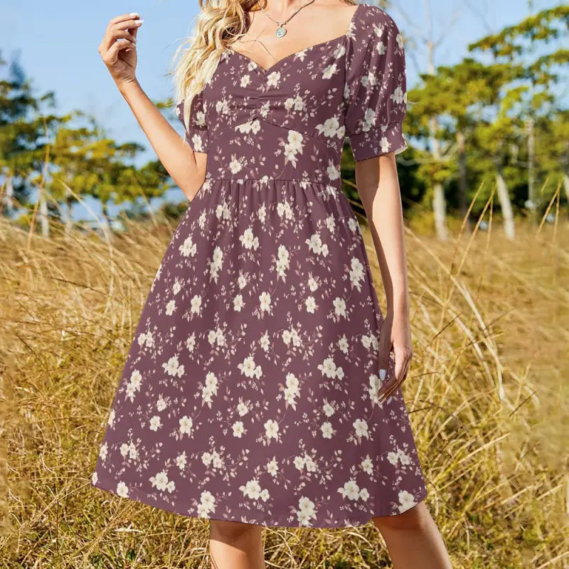 Floral sweetheart dress in purple with puff sleeves, perfect for a trendy vibe