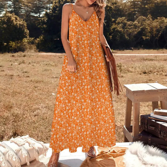 Orange floral ankle dress with thin straps and a flowy silhouette for stylish vibes