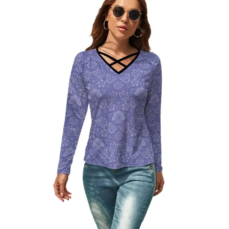 Purple floral long sleeve t-shirt with crisscross neckline for a trendy casual vibe