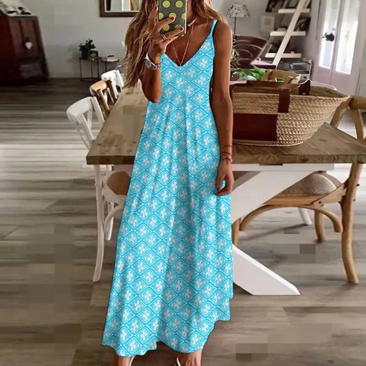 Bright blue floral print flowing sleeveless boho maxi dress perfect for summer vibes