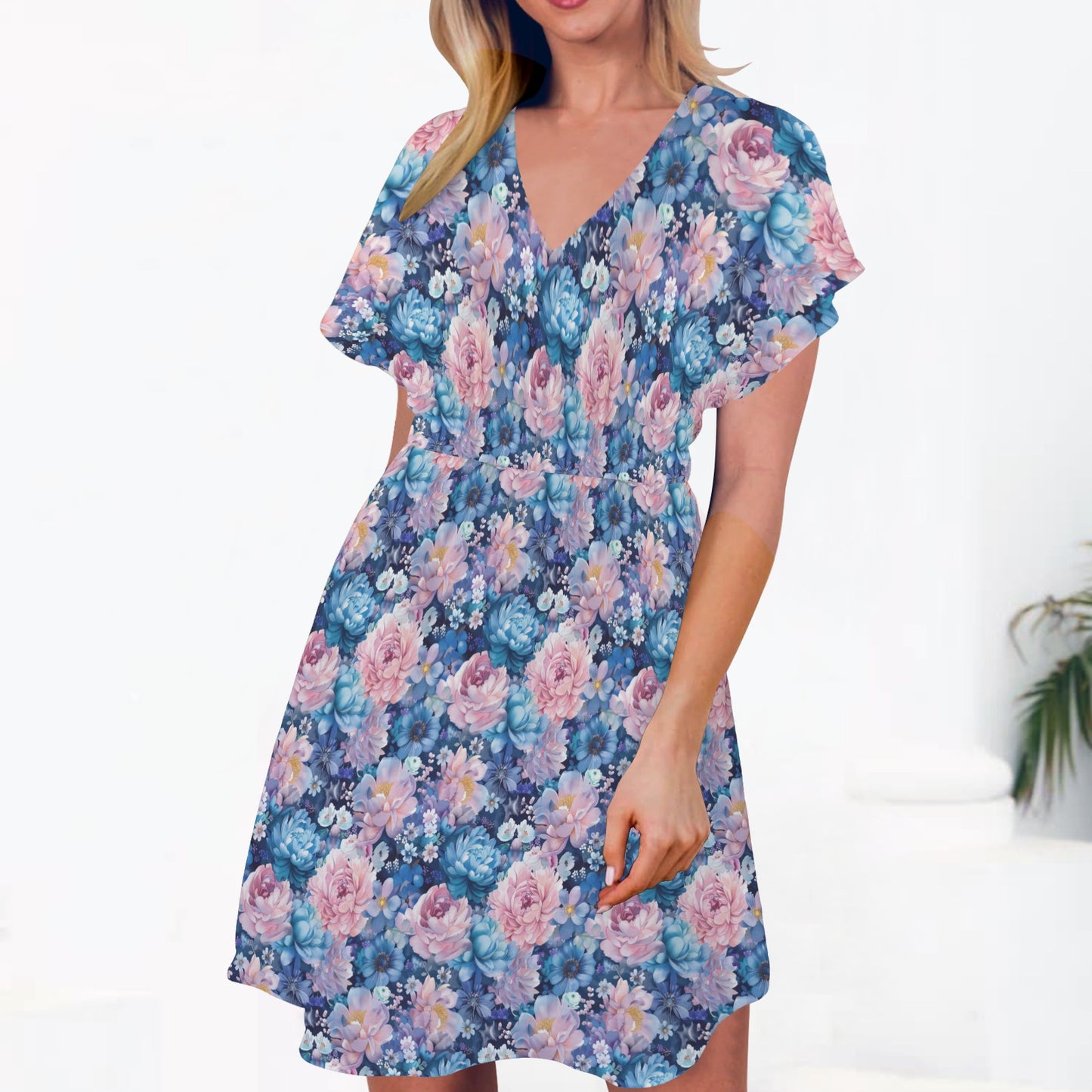 short sleeve floral dress holding skirt detail