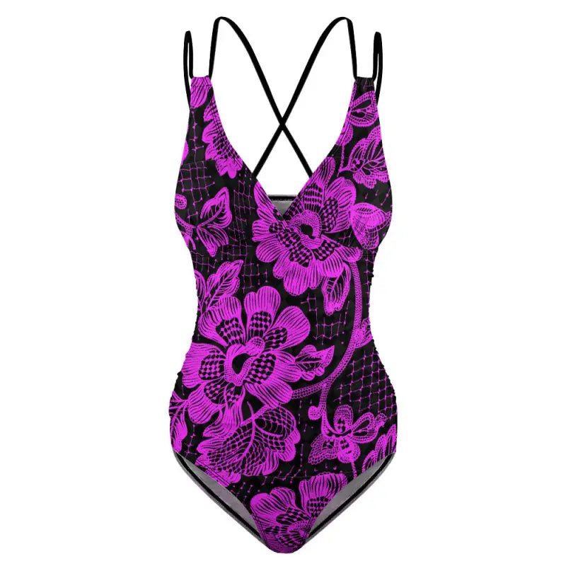 Purple and black floral one-piece swimsuit with stylish sling design and crossed back straps