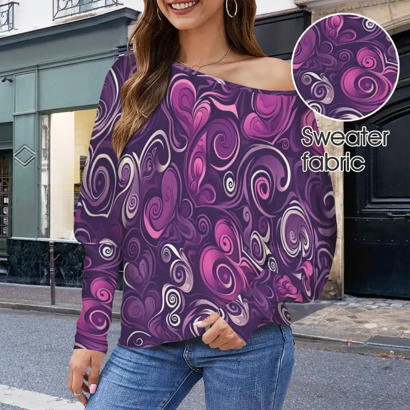 Off-shoulder sweater featuring enchanting purple floral patterns in pink swirls