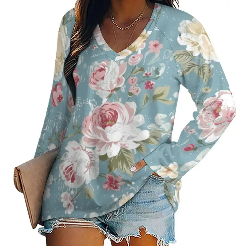 Light blue long-sleeved t-shirt with v-neck design, pink rose floral pattern
