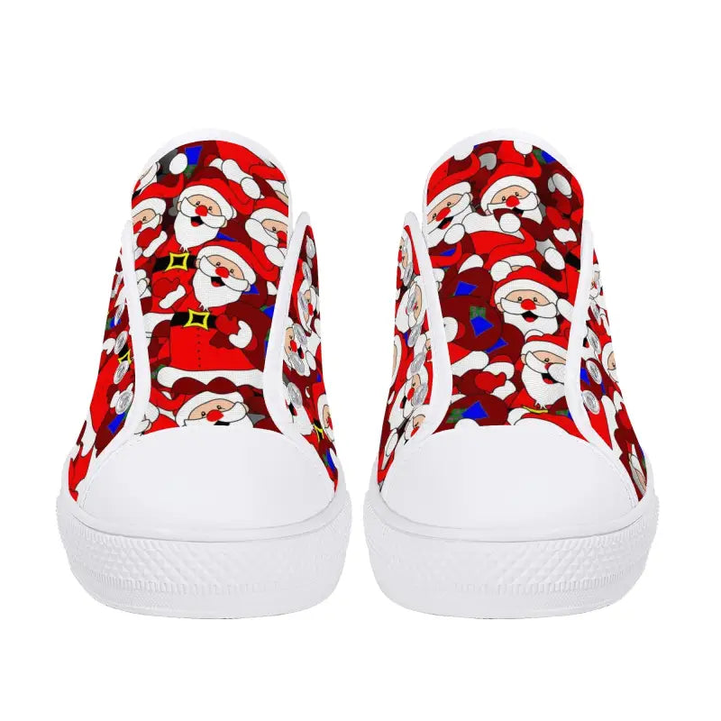 Pair of red Santa Christmas sneakers with a fun holiday pattern for festive vibes