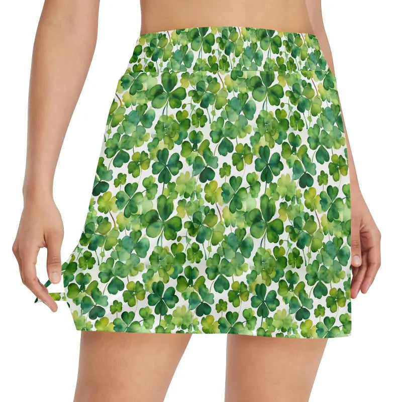 Short skirt featuring a green shamrock pattern from the Women’s Shamrock Golf Skort