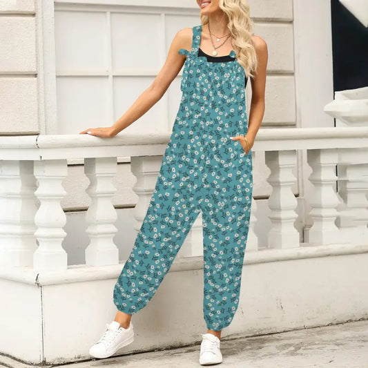 Teal Floral Jumpsuit with spaghetti straps and loose pants for a comfy, stylish look