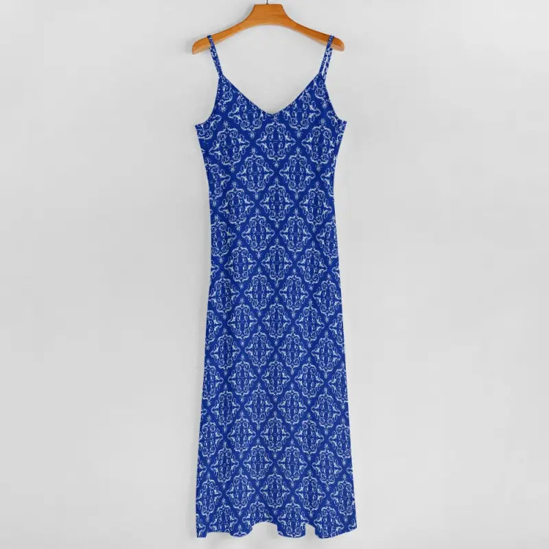 Blue and white damask-patterned blue boho maxi dress on a wooden hanger