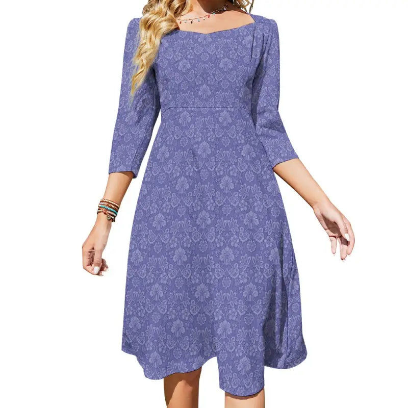 Purple sweetheart flare dress with 3/4 sleeves and a flared skirt, perfect for twirling