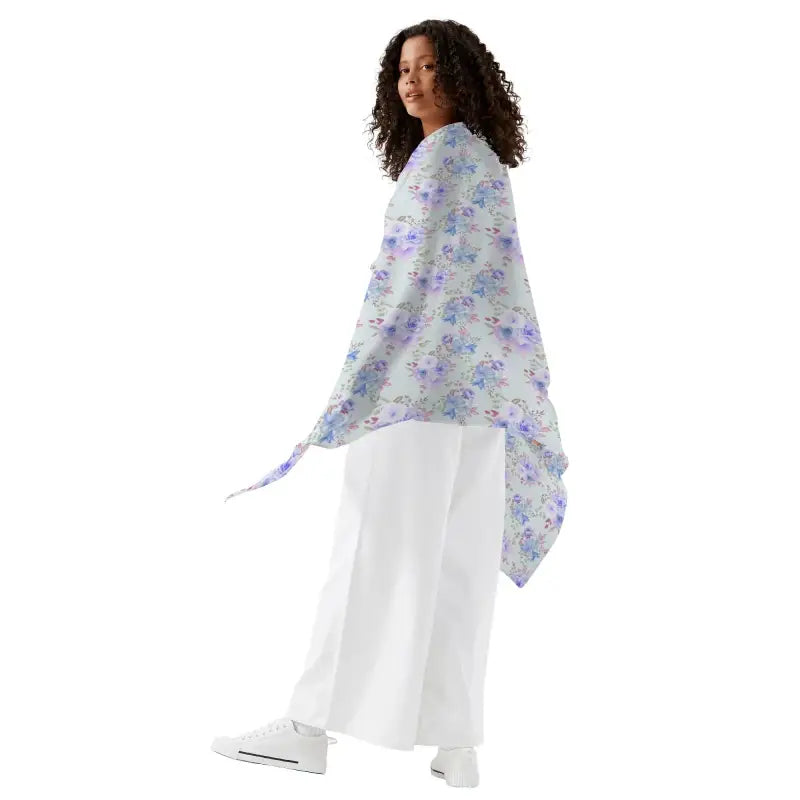 Womens Blue Pattern Sarong Cover Up draped over a person in white clothing with floral design