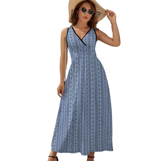 Blue and white striped sleeveless maxi dress with a flattering V-neckline