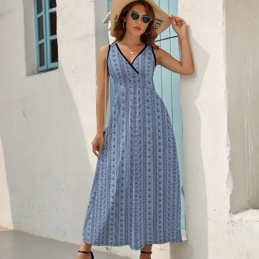 Blue and white striped sleeveless maxi dress with a V-neckline for stylish summer vibes