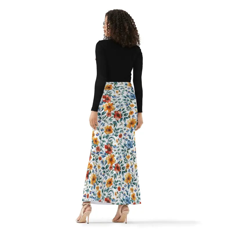 Womens Floral Fit and Flare Maxi Skirt with a black long-sleeved top styled together