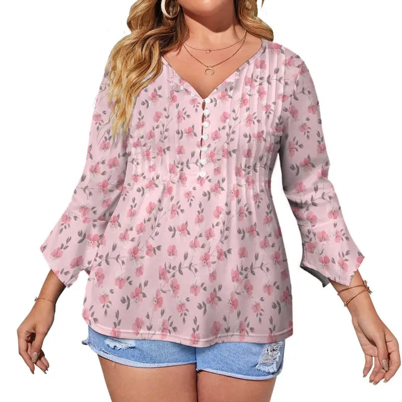 Women’s pink floral print blouse with V-neck and long sleeves in bohemian style